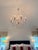 2000 - 2009 French Provincial Style Painted Iron & Crystal Twelve-Light Chandelier For Sale - Image 5 of 6