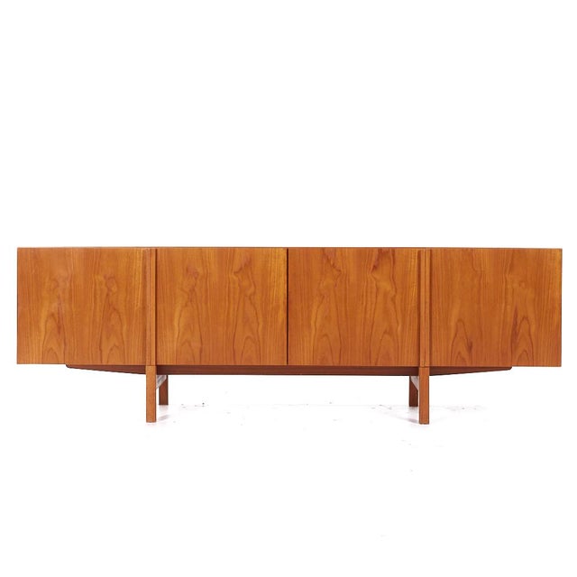 Kofod Larsen for Faarup Møbelfabrik Mid Century Danish Teak Credenza This credenza measures: 90.5 wide x 19.5 deep x 29...