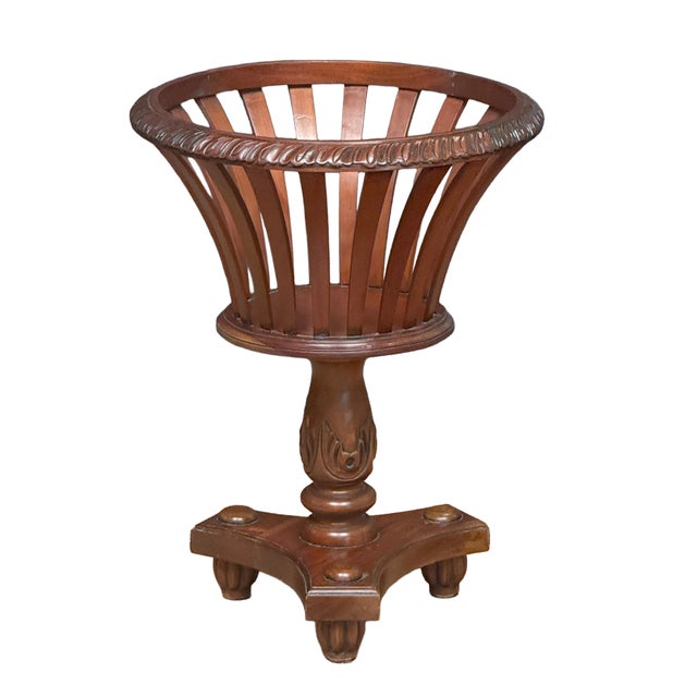 A fine English plant stand or jardiniere from the Edwardian era, featuring a basket with a goblet or chalice-like shape...