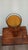 This is a mid-century modern style accent. Tall, amber-colored glass cylinder vase minimalist silhouette. Tubular design...