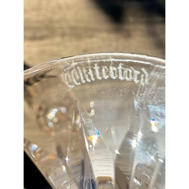 Elegant matched pair of Waterford Crystal Golden Lismore Tall champagne flutes featuring the iconic Lismore cut pattern...