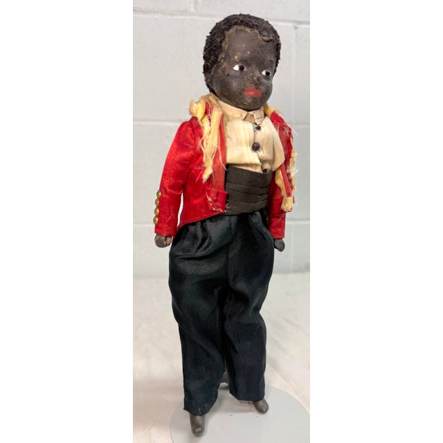 This rare antique handmade African American boy doll from the early 19th century is a unique and collectible piece. Made...