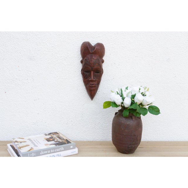 This charming Kwele mask from Gabon or the Republic of Congo is a delightful example of African tribal art. The mask is...