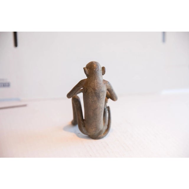 Metal Vintage African Sitting Monkey With Banana Sculpture For Sale - Image 7 of 8