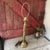 This vintage brass table lamp features a bamboo-inspired design and a warm, golden finish. Its compact 21"x6" size makes...