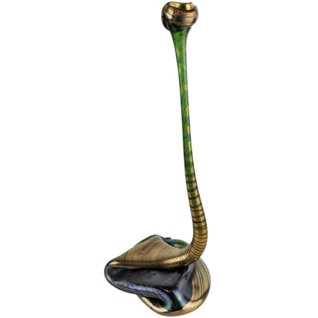 Decorative snake vase (Schlangenvase) in iridescent art glass. Germany, circa 1980–1990. The vase is formed as a single...