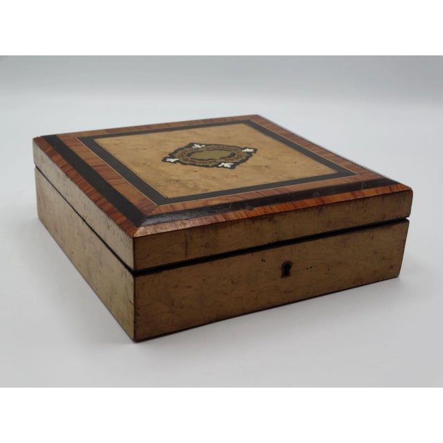 Fine quality French boulle and marquetry dresser box. It is handcrafted of bird's eye maple, kingwood and ebony and inlaid...