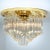 This exceptional flush mount was manufactured by Venini in Italy. The lamp has clear Murano Triedri crystals of varying...