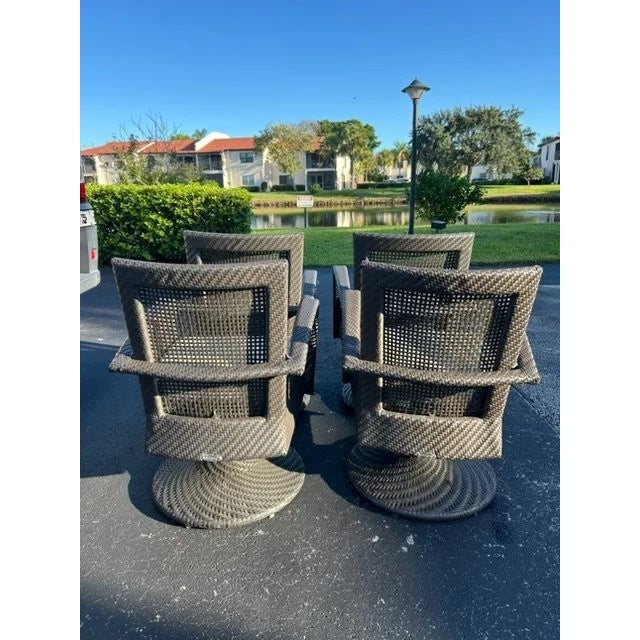 Modern Set of 4 Woodard Woven Outdoor Swivel Chairs With Cushion. For Sale - Image 3 of 4