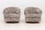 Pair of Milo Baughman Style Barrel Swivel Arm Chairs, with purple hue abstract upholstery and matching armrest covers....