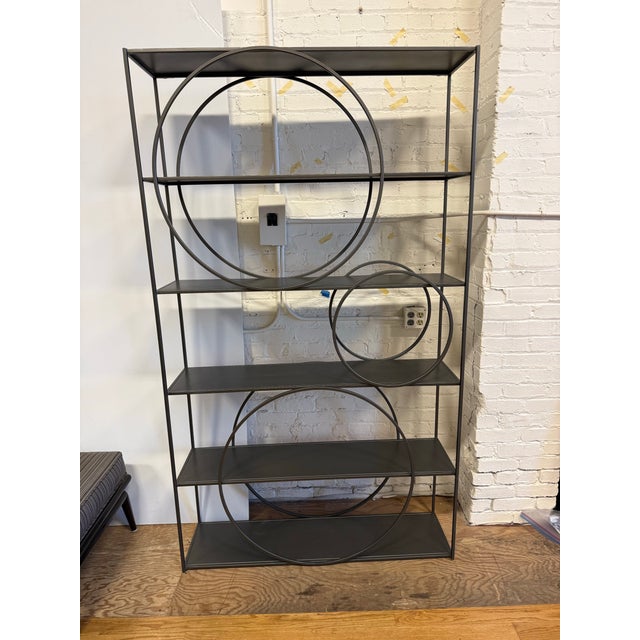 Design Plus Gallery presents the Danielle Five-Shelf Bookshelf from Four Hands. This sculptural shelving unit is...