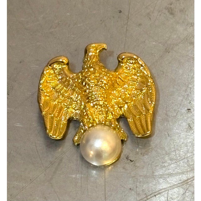 1960s-70s gold-tone/faux pearl eagle brooch. Excellent condition.
