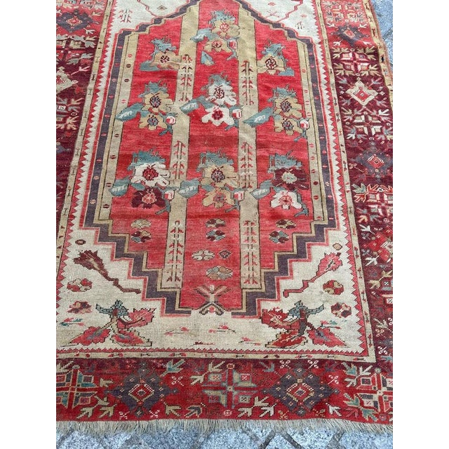 Exquisite Antique Turkish Rug from the Early 19th Century! Discover the timeless beauty of this stunning Turkish rug,...