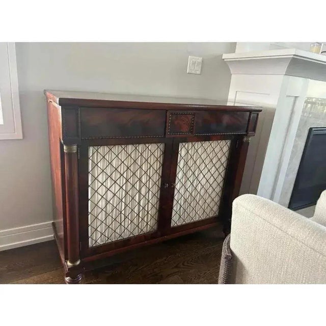 Offered is a vintage neoclassical style sideboard by Henredon from their Natchez historic collection. This piece is heavy,...