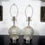 Pair of diamond patterned spherical mercury glass lamps.