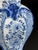 A beautiful example of 18th-century Dutch faience, crafted by the Van Duijn workshop in the Delft style. The vase features...