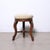 A beautiful 19th-century piano stool, it features a padded swivel seat with height adjustment via a central screw....