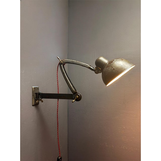 1930s kaiser idell model 6716 wall lamp designed by renowned bauhaus designer christian dell. these lamps were fixed to...