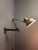 1930s kaiser idell model 6716 wall lamp designed by renowned bauhaus designer christian dell. these lamps were fixed to...