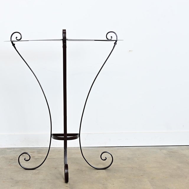 French early 20th century tall iron console table, recently sandblasted and powder-coated in a dark bronze effect for...