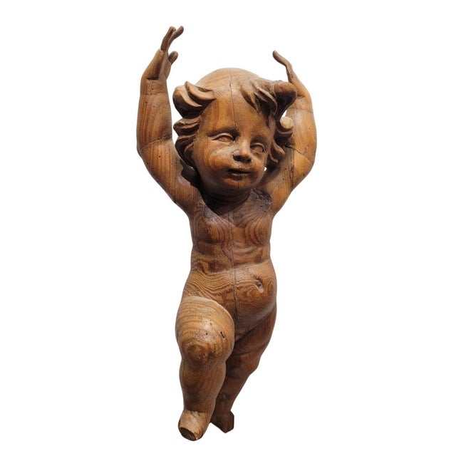 Pair of putti or triumphant angels, carved wood, late 18th century An exceptional pair of putti or triumphant angels...