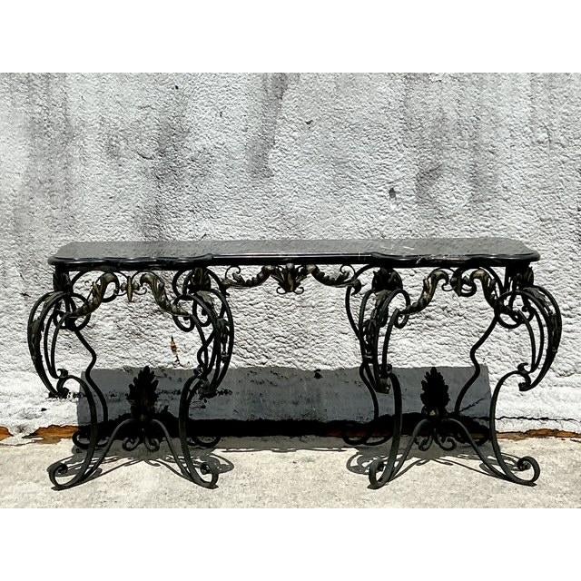 Command attention with this grand Vintage Regency Wrought Iron Console Table, a magnificent piece that seamlessly blends...