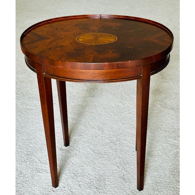 VIntage Council Craftsmen Furniture drinks table with inlaid shell motif and beautiful flame mahogany. Table has Council...