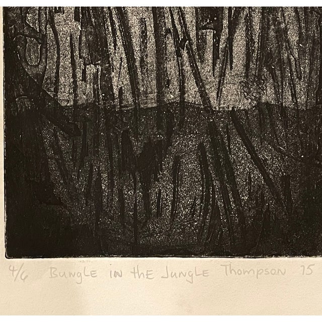 1975 etching and aquatint by Thompson titled "Bungle in the Jungle." MCM style lion against a jungle background. Pencil...
