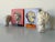 A compelling pair of contemporary pottery bust sculptures by artist Cris Cooper, created circa 2016. Inspired by classical...