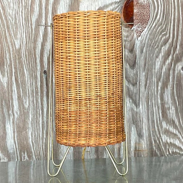 A striking vintage Coastal table lamp. Designed by the iconic Paul Mayen group. Festered in the 1952 MOMA collection. A...