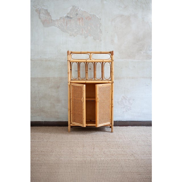 Small Bamboo and Vienna Straw Cabinet – 1970s Product details Storage cabinet crafted in natural bamboo with doors clad in...