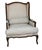 A Vintage Restoration Hardware, Wingback "Lorraine Chair". Traditional Rococo carvings and ornamentation have been...