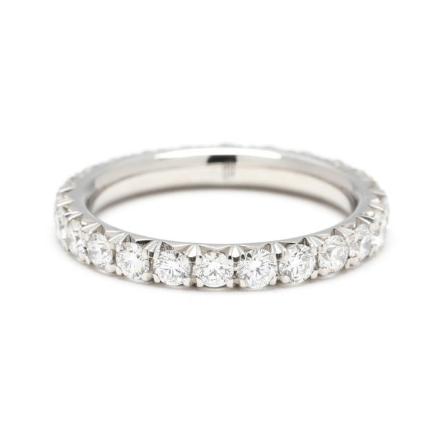 Stones: diamond, 24 round brilliant cut 2.1 mm approximately 1 total carat FG color/ VS1-2 clarity Ring Size 4 Rise Off Of...