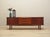 The sideboard was made in the 1970s, Danish production. The structure is covered with teak veneer. The legs are made of...