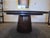 Baker's Encircle Dining Table from The Barbara Barry Collection. This circular dining table is 67"Dia x 30"H. The primary...