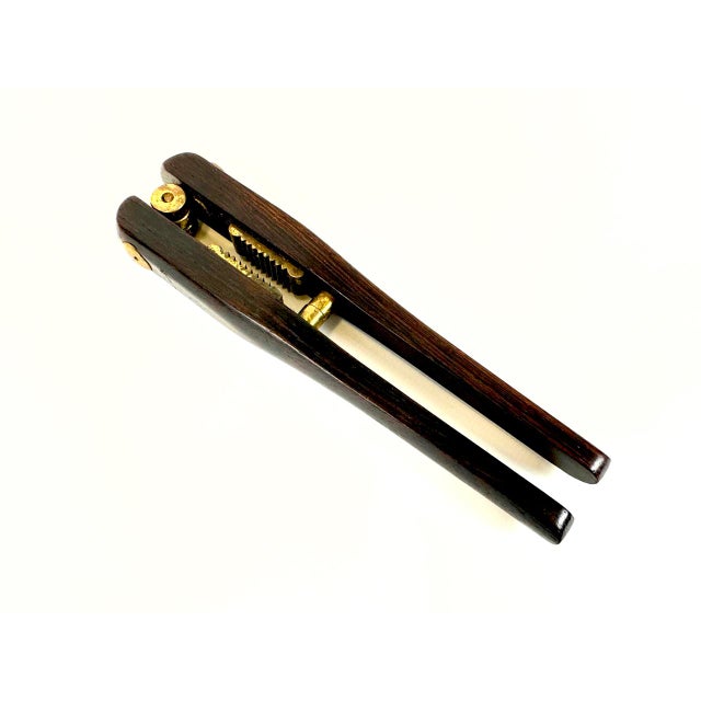 Mid-Century Modern Rosewood and Brass Nutcracker by Poul Knudsen, 1950s, in Very Good conditions. Designed 1950 to 1959...