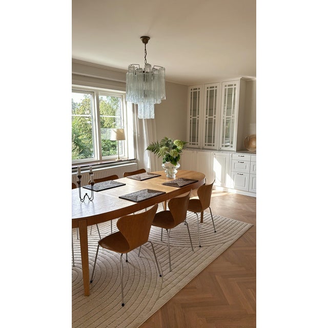 Pair of elegant statement (perfect for a corridor hallway or stairwell) murano chandeliers with tubular glass prisms....