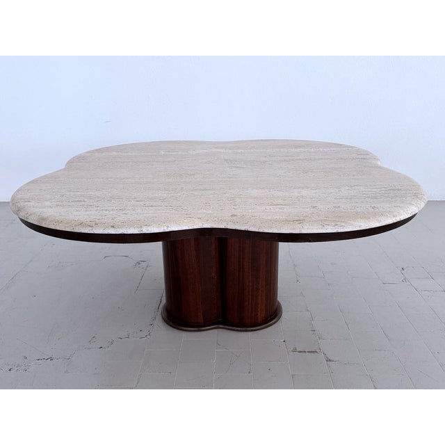 A beautiful and striking coffee table from the 1970s, made in Italy. The base frame consists of dark oak veneer and a...