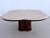 A beautiful and striking coffee table from the 1970s, made in Italy. The base frame consists of dark oak veneer and a...