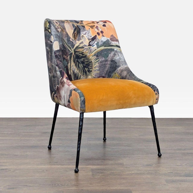 Add style to your living space with this Anthropologie lounge chair. It features a unique floral and swan print fabric,...