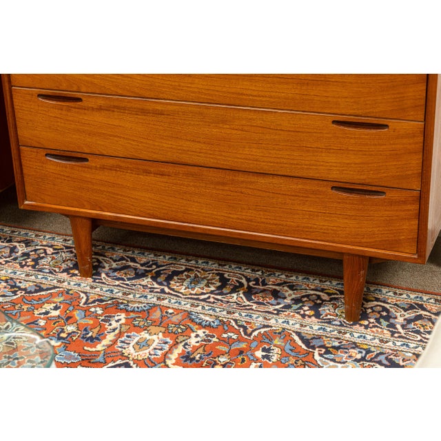 A vintage tallboy dresser by Ib Kofod Larsen for J. Clausen & Son Brande Mobelfabrik. This gorgeous 1960s mid century...