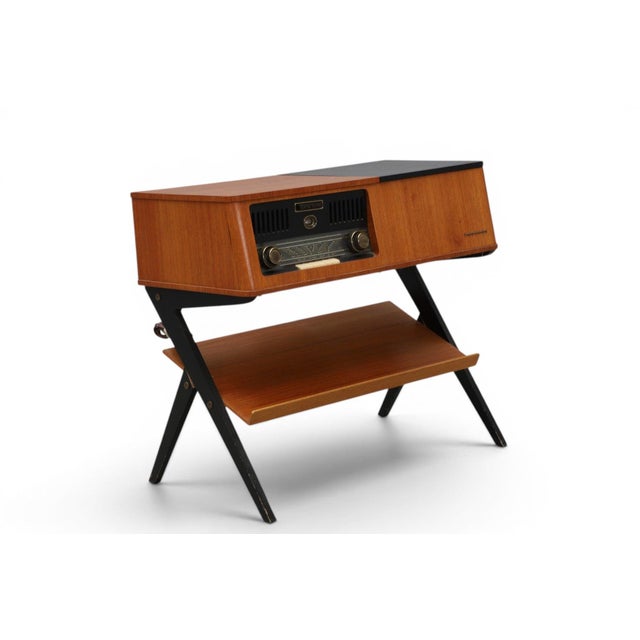 A wonderfully preserved 1950s Philips Type F5574A radio and record console in teak. A fully integrated entertainment unit...