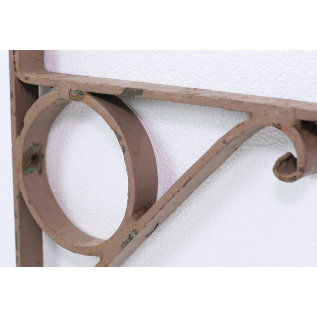Light brown painted steel or wrought iron shelf brackets. Good condition with surface wear from prior use. Priced as a...