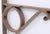 Light brown painted steel or wrought iron shelf brackets. Good condition with surface wear from prior use. Priced as a...