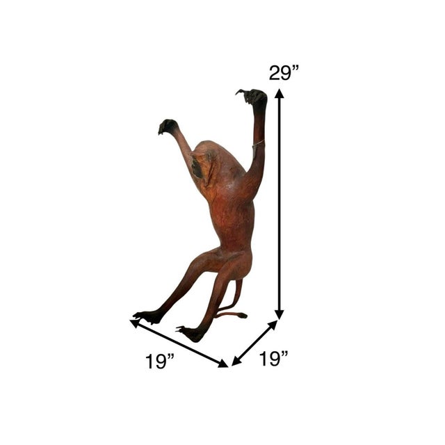 Life-size leather-wrapped monkey with lifelike glass eyes. Bold safari-style statement for eclectic interiors. Condition:...