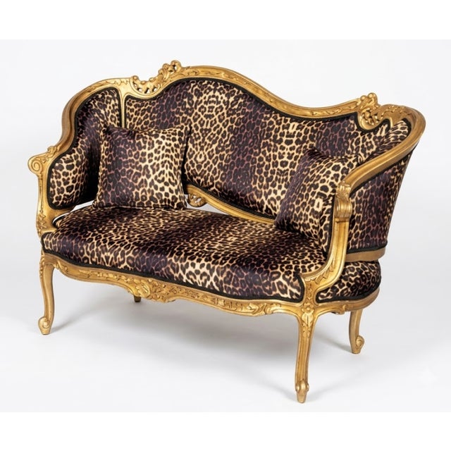 Made with real solid wood and gilded in gold leaf. Animal print leopard upholstery Width 57 ” × Depth 25 × Height of 38”...