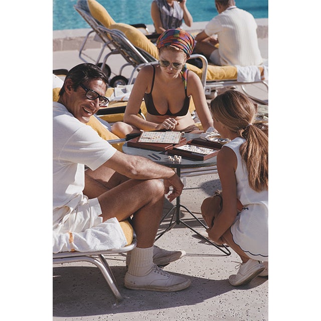 Slim Aarons, Scrabble in Palm Springs, Estate Stamped Photographic Print For Sale