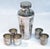 This silverplated, Art Deco cocktail shaker set comes with 5 cups and the shaker includes a lid, strainer, and mixer. The...
