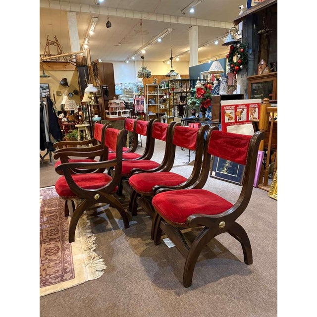 An exceptional Mid-Century Modern custom made vintage dining table and six curule style chairs by Marlau of Madrid, circa...