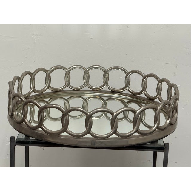 Design Plus Gallery presents the Circa Mirrored Tray from Z Gallerie. This round decorative is designed with a mirrored...